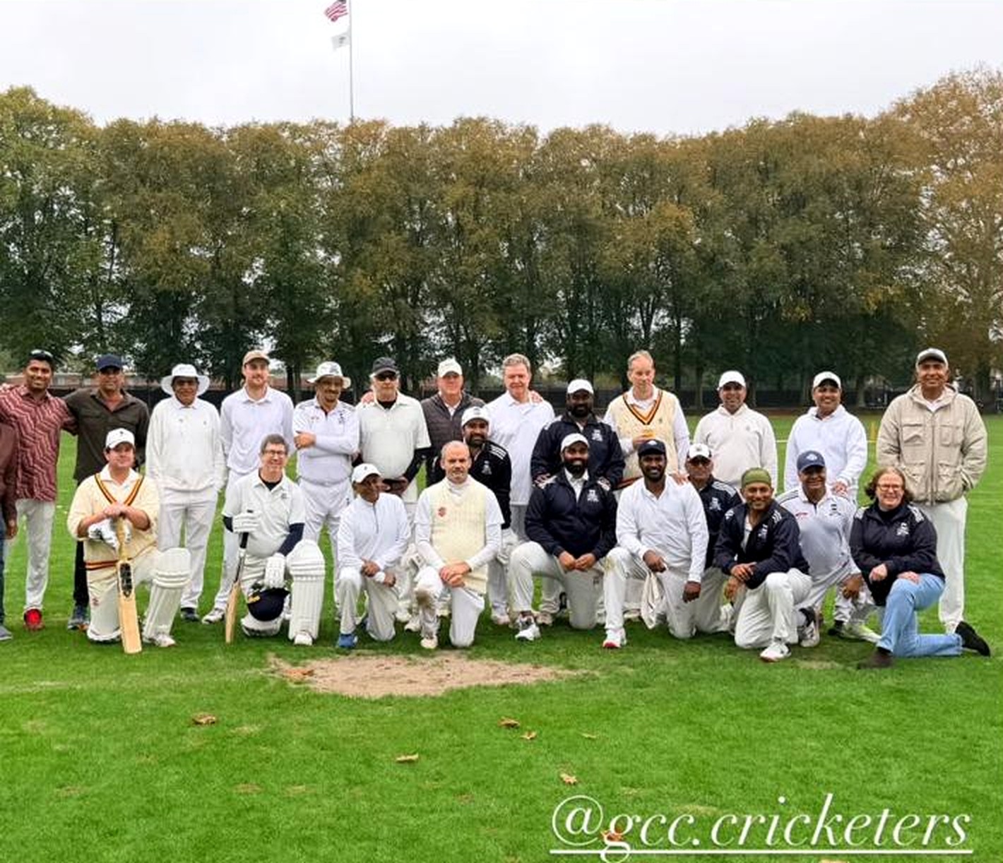 Germantown and Philadelphia Cricket Club players together on the Manheim lawn after the October 4, 2026 match